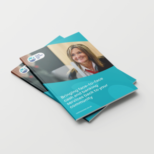 A stack of brochures with a woman on the cover and text that reads ‘Bringing face-to-face cashless banking services back to your community!' The brochure is designed using the Cash Access UK visual identity and branding.