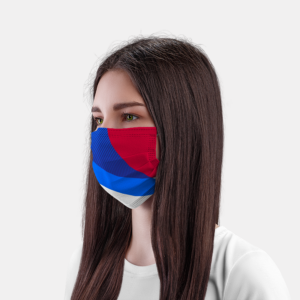A person with long brown hair wearing a blue and red face mask to protect themselves from airborne viruses. The mask is branded with graphics developed for the Unitaid visual identity, concept by 400.